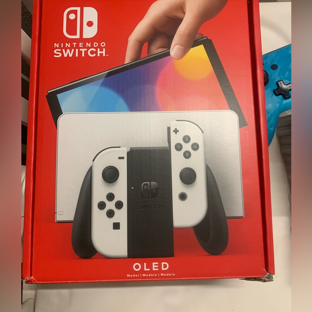 Like new barely used Nintendo Switch OLED with 11 games